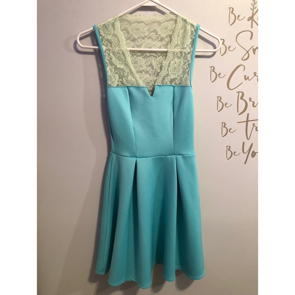 Short blue dress with lace